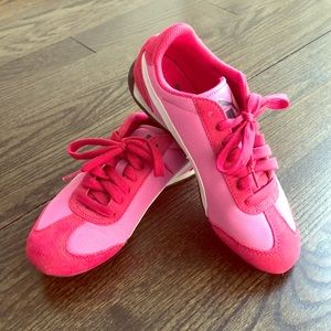 Hot pink Puma tennis shoes